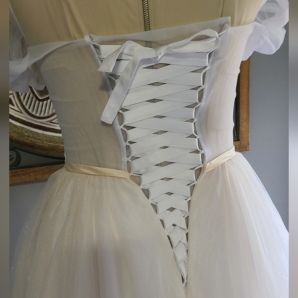 Alluring Tulle Off-the-shoulder Neckline A-line Wedding Dress With Belt - Picture 10 of 14